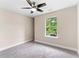 Cozy bedroom with carpet, ceiling fan, and natural light at 1125 Reunion Pl, Atlanta, GA 30331