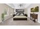Well-appointed bedroom with dark wood furnishings and natural light at 1125 Reunion Pl, Atlanta, GA 30331
