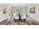 Elegant dining room with modern chandelier, large window, and stylish decor at 1125 Reunion Pl, Atlanta, GA 30331