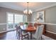 Dining room featuring hardwood floors, neutral walls, and bright lighting at 1991 River Forest Dr, Marietta, GA 30068
