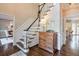 Classic foyer featuring hardwood floors, staircase, and trim accents at 1991 River Forest Dr, Marietta, GA 30068
