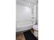 Bathroom featuring a tub with shower, white toilet, and tiled floor at 4964 N Ellipse Dr, Marietta, GA 30068