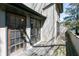 The light gray back deck has a door with glass panes and two windows at 4964 N Ellipse Dr, Marietta, GA 30068