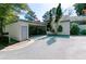 Charming single-Gathering home featuring an attached carport and mature trees at 4964 N Ellipse Dr, Marietta, GA 30068