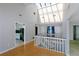 Upstairs hallway with skylight with lots of natural light at 4964 N Ellipse Dr, Marietta, GA 30068