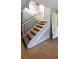 Carpeted staircase with white railing, leading to the upper level of the home at 4964 N Ellipse Dr, Marietta, GA 30068