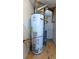 A Rheem Fury hot water heater with attached expansion tank sits in a utility area at 4964 N Ellipse Dr, Marietta, GA 30068