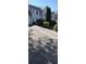 Long driveway leading up to a two-story house with green landscaping at 3247 Sugar Creek Se Trce, Atlanta, GA 30316