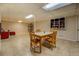 Large finished basement boasting tile flooring, room for dining or recreation, and ample lighting at 460 Haynes Creek Circle, Oxford, GA 30054