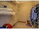 Functional walk-in closet with wire shelving providing ample storage and organization solutions at 460 Haynes Creek Circle, Oxford, GA 30054