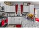 Bright kitchen featuring granite counters, stainless steel appliances and white cabinets at 5462 S Crest Ridge S Dr, Ellenwood, GA 30294
