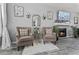 Cozy living room featuring neutral walls, fireplace, and hardwood floors at 5462 S Crest Ridge S Dr, Ellenwood, GA 30294
