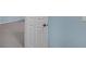 Basement with neutral carpet, a white door and blue walls at 6206 Carriage Gate Se Ln # 6, Mableton, GA 30126