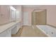 The primary bath features dual sinks, a soaking tub, and a glass-enclosed shower at 6206 Carriage Gate Se Ln # 6, Mableton, GA 30126