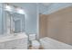 Bathroom with a shower-tub combination, white vanity, and contemporary finishes at 6206 Carriage Gate Se Ln # 6, Mableton, GA 30126