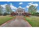 Clubhouse featuring lush landscaping and a brick walkway at 6206 Carriage Gate Se Ln # 6, Mableton, GA 30126