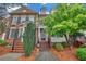 Charming two-story brick townhouse with landscaped front yard, and classic architectural details at 6206 Carriage Gate Se Ln # 6, Mableton, GA 30126