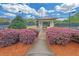 Charming community gazebo surrounded by colorful landscaping and manicured grounds at 6206 Carriage Gate Se Ln # 6, Mableton, GA 30126