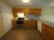 Functional kitchen with ample cabinet space, stainless steel appliances, and durable flooring at 6016 Creekerton Blvd, Mcdonough, GA 30252