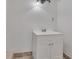 Bathroom vanity features a sleek, white cabinet for practical storage at 6991 Flagstone Dr, Austell, GA 30168
