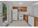 Efficient kitchen featuring stainless steel appliances, granite countertops, and access to a wooden balcony at 6991 Flagstone Dr, Austell, GA 30168