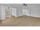 Spacious main bedroom with tray ceiling, windows, and adjacent sitting area at 9429 Golfview Pt, Villa Rica, GA 30180