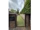 Turfed dog run with convenient rules ensures a clean and safe play area for pets at 955 Juniper St # 3026, Atlanta, GA 30309