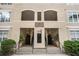 Exterior staircase and entryway featuring well-maintained landscaping and secure access at 955 Juniper St # 3026, Atlanta, GA 30309