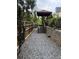 Outdoor gazebo with stairs provides a tranquil escape amidst landscaped surroundings at 955 Juniper St # 3026, Atlanta, GA 30309