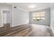 Spacious living room with a large window, hardwood floors, and plenty of natural light at 955 Juniper St # 3026, Atlanta, GA 30309