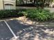 Designated parking space in a community area with landscaping at 955 Juniper St # 3026, Atlanta, GA 30309