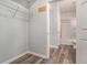 This walk-in closet leads to an updated bathroom with tile surround at 955 Juniper St # 3026, Atlanta, GA 30309