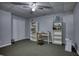 Spacious finished basement perfect as office or recreation room with neutral carpet at 9600 Poplar Ct, Douglasville, GA 30135