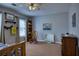 Bedroom with rocking chair and natural light at 9600 Poplar Ct, Douglasville, GA 30135
