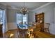 Traditional dining room with chandelier and wood furniture at 9600 Poplar Ct, Douglasville, GA 30135