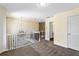 Upstairs hallway featuring carpet flooring, iron railings, and neutral wall paint, creating a cozy atmosphere at 1318 Avington Glen Dr, Lawrenceville, GA 30045