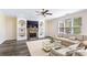 Living room featuring a fireplace and natural lighting at 1318 Avington Glen Dr, Lawrenceville, GA 30045