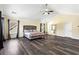 Large main bedroom has hardwood floors, natural light and ensuite bathroom at 1318 Avington Glen Dr, Lawrenceville, GA 30045