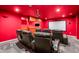 Home theater room featuring a large screen, projector, surround sound, and comfortable seating at 1318 Avington Glen Dr, Lawrenceville, GA 30045