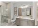 Modern bathroom with walk-in shower, floating vanity, and neutral finishes at 2235 Chestnut Pass, Decatur, GA 30033