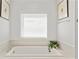 Corner soaking tub featuring tile surround and a large window at 2235 Chestnut Pass, Decatur, GA 30033