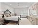 Bright bedroom with hardwood floors, a decorative headboard and neutral decor at 2235 Chestnut Pass, Decatur, GA 30033