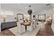 Open concept dining room featuring hardwood floors and views of the living room at 2235 Chestnut Pass, Decatur, GA 30033