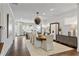 Dining room boasting hardwood floors, designer lighting, and views of the kitchen at 2235 Chestnut Pass, Decatur, GA 30033