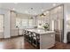 Spacious kitchen featuring a large island with seating and stainless steel appliances at 2235 Chestnut Pass, Decatur, GA 30033