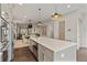 Bright and airy kitchen boasting eat in bar, island, and stainless steel appliances at 2235 Chestnut Pass, Decatur, GA 30033