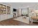 Elegant living room with custom built-ins, fireplace, TV and cozy seating, perfect for entertaining at 2235 Chestnut Pass, Decatur, GA 30033