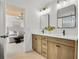 Contemporary bathroom featuring double vanity, modern fixtures, and neutral tones at 307 Rockledge Sw Bnd, Powder Springs, GA 30127