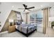 Stylish bedroom with sporty decor, comfortable bed, and natural light at 307 Rockledge Sw Bnd, Powder Springs, GA 30127