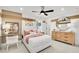 Inviting bedroom with unique accents, plush bed, and lots of natural light at 307 Rockledge Sw Bnd, Powder Springs, GA 30127